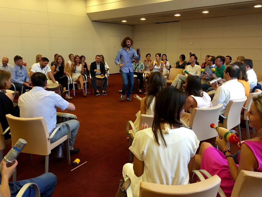 team building drum circle lucca